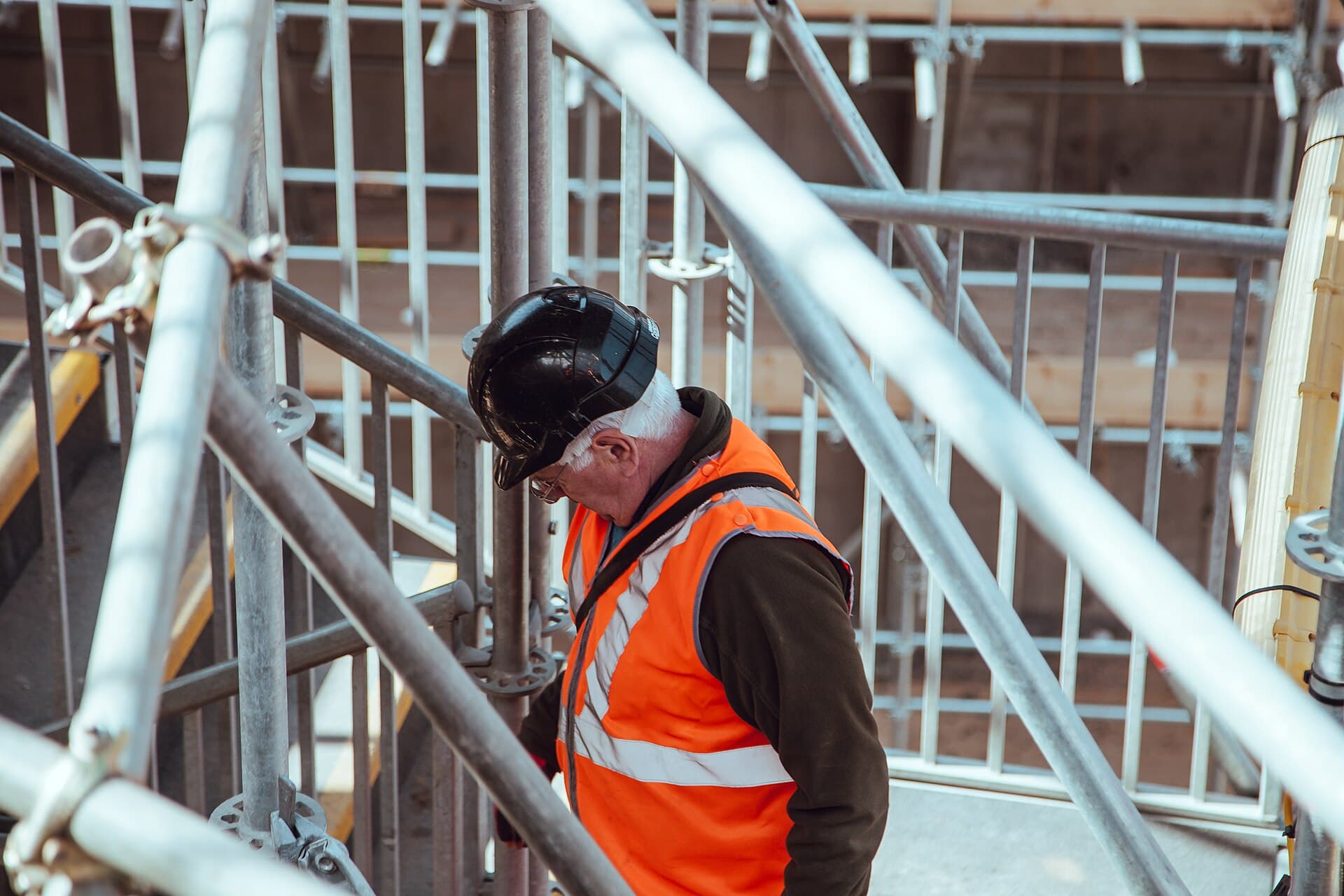 Engineers and tradespeople working on a building site